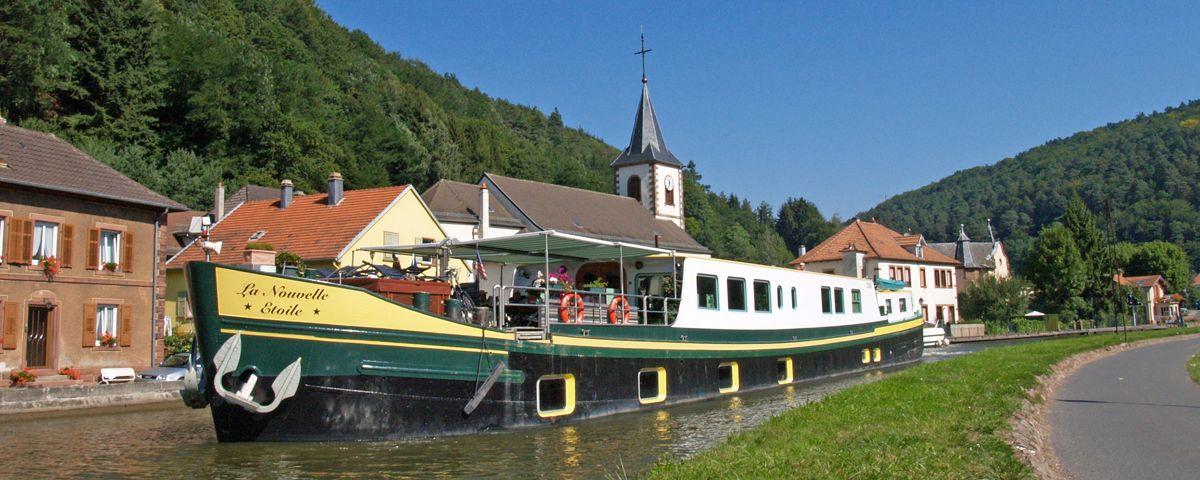 CRUCEROS FLUVIALES CANALES DE FRANCIA CANALES DE HOLANDA LA NOUVELLE ETOILE CANAL DU LOING CANAL DE BRIARE CANAL DE LA BOURGOGNE CANAL DE LA BORGOÑA ALSACE ALSACIA CHAMPAGNE CRUISE LA NOUVELLE ETOILE HOTEL BARGE